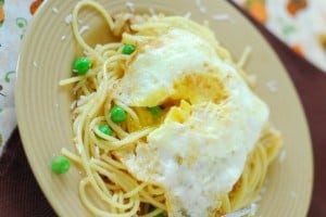 fried egg over pasta